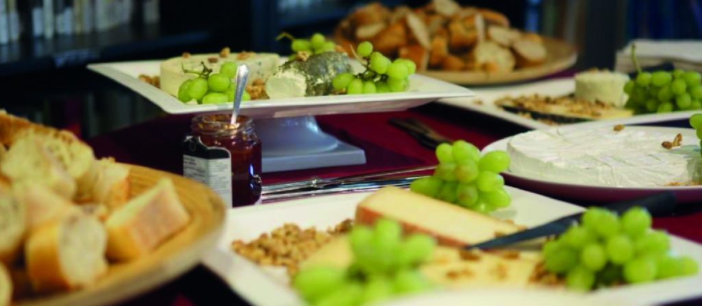 Wine and cheese spread for party goers at Soirée Bretagne